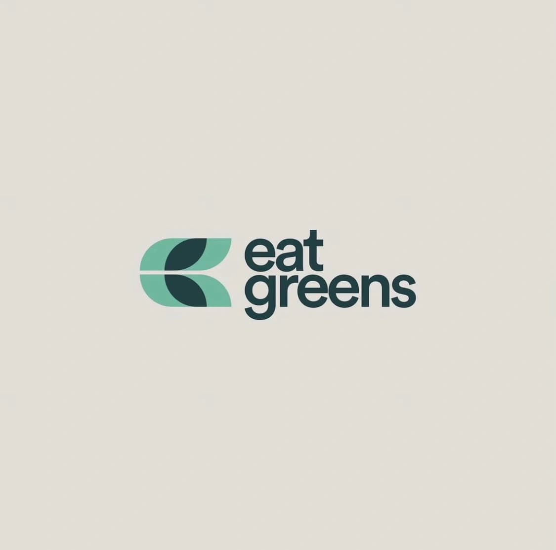 Eat Greens solid green emblem and rounded wordmark on a neutral ground