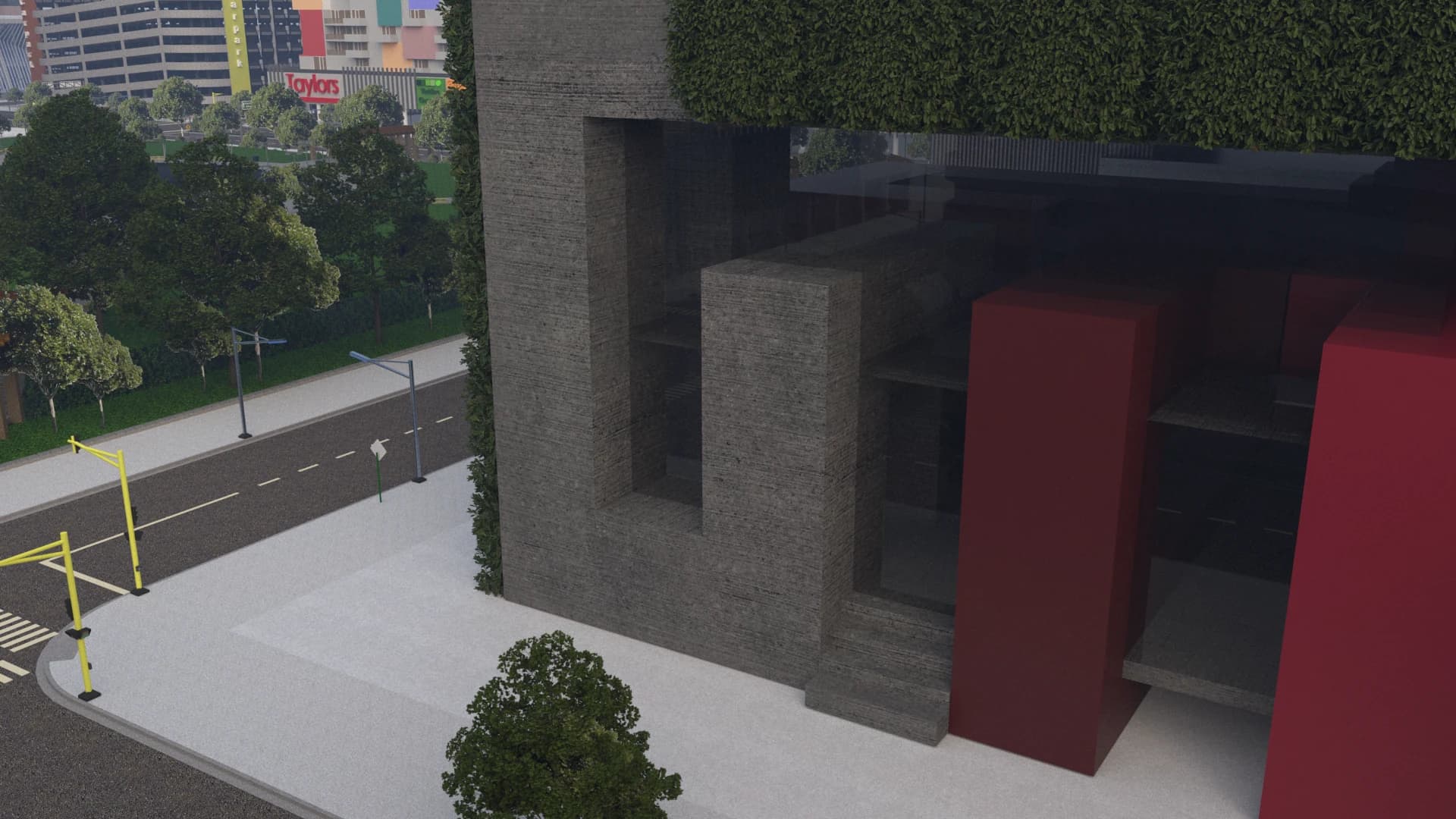 Street-level view of the deep red entrance and concrete frame