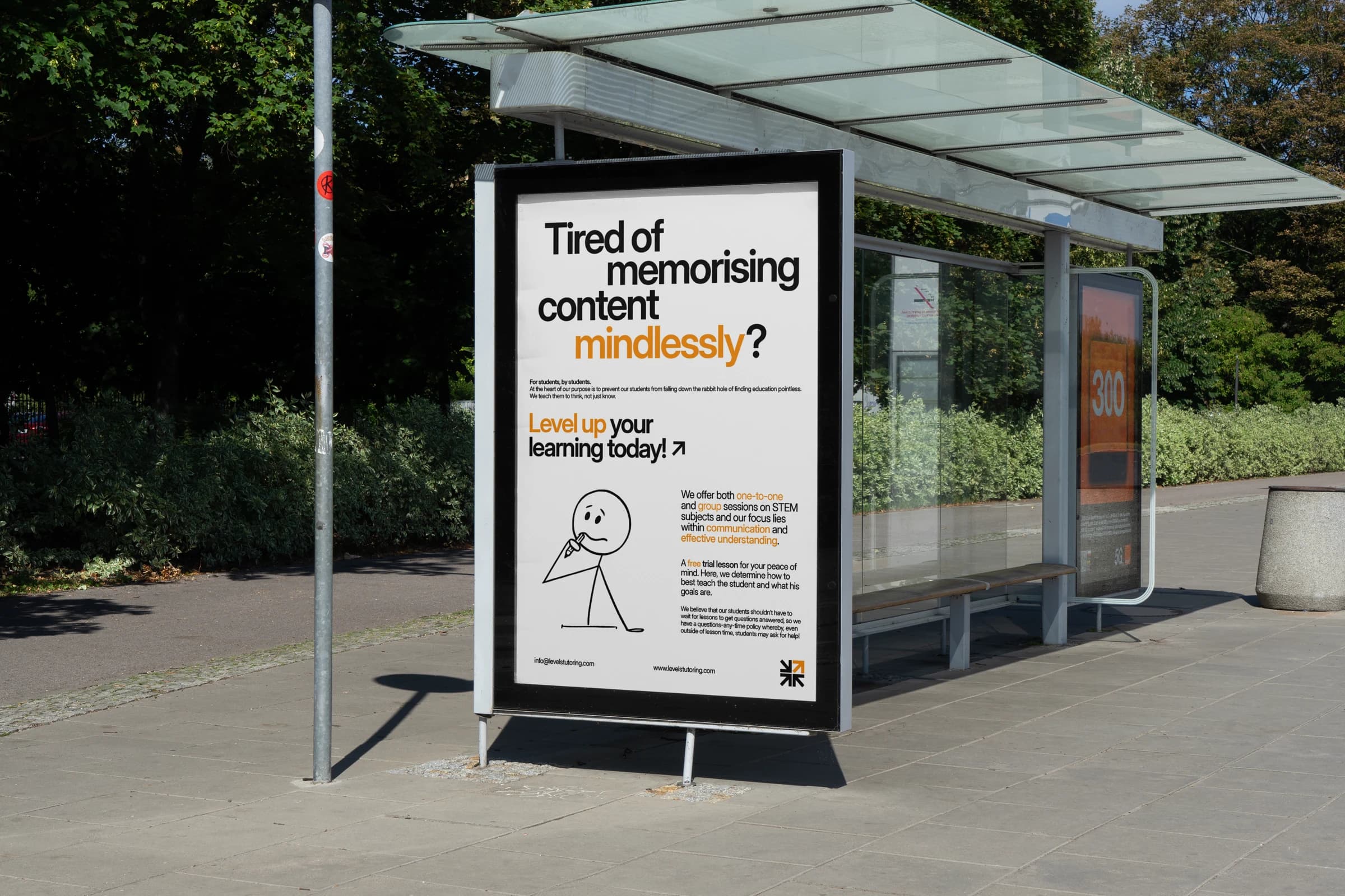 Presentation mockup of the Levels learning campaign at a bus shelter